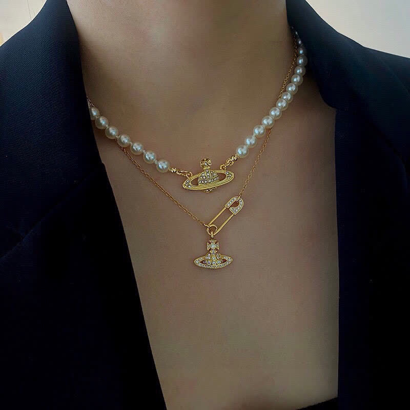Vivienne Westwood Gold Tone Safety Pin & Hat Pendant Necklace